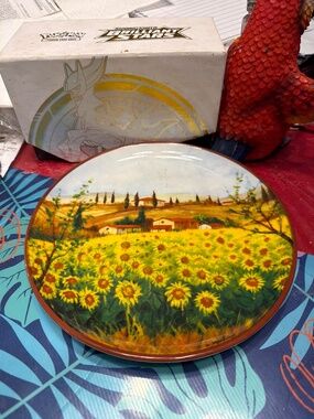 CMG Ceramicas Portugal salad plate features a vibrant sunflower and countryside